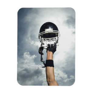 Ímã Jogador de futebol que guardara o capacete no ar