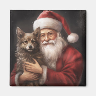 Imã Kelpie australiano com Papai Noel no Natal