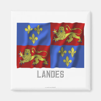 Imã Landes acenando bandeira com nome