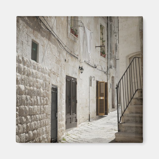 Imã Lavadeira pendurada para secar num beco em Itália (Frente)