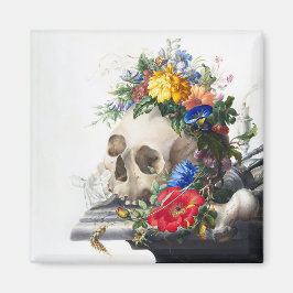 Imã Magnet with skull and flowers scene.