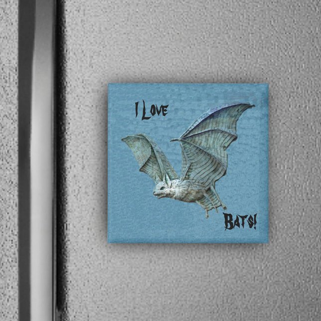 Imã Magneta Alivio Azul Voadora (I love Bats blue magnet with flying blue bat white face.)