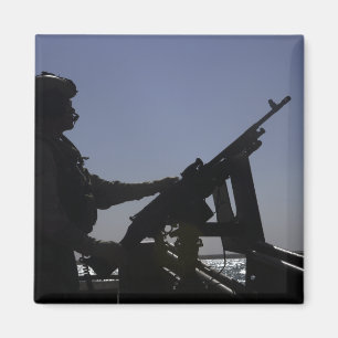 Imã Manning de um metralhador M240 no Iraque