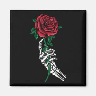 Imã Mão De Esqueleto Segurando Um Bolso De Rosa vermel