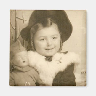 Imã menina com ímã de boneca