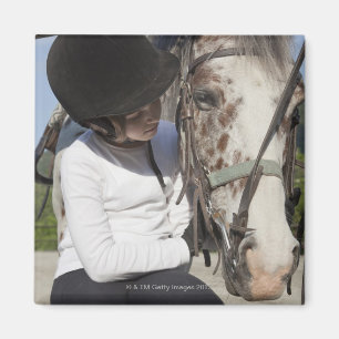 Imã Menina com seu cavalo