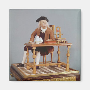 Imã Modelo de Benjamin Franklin em sua mesa