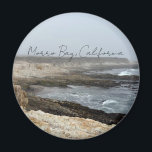 Imã Morro Bay California Coastal Photography<br><div class="desc">A foggy overcast day in Morro Bay California with the ocean waves hitting the rocks on the shore in this beach photograph souvenir. This seaside travel photo keepsake magnet features black cursive script above the beach rocks and grey sky.</div>
