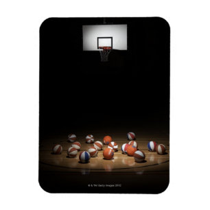 Ímã Muitos basquetebol que descansam no assoalho