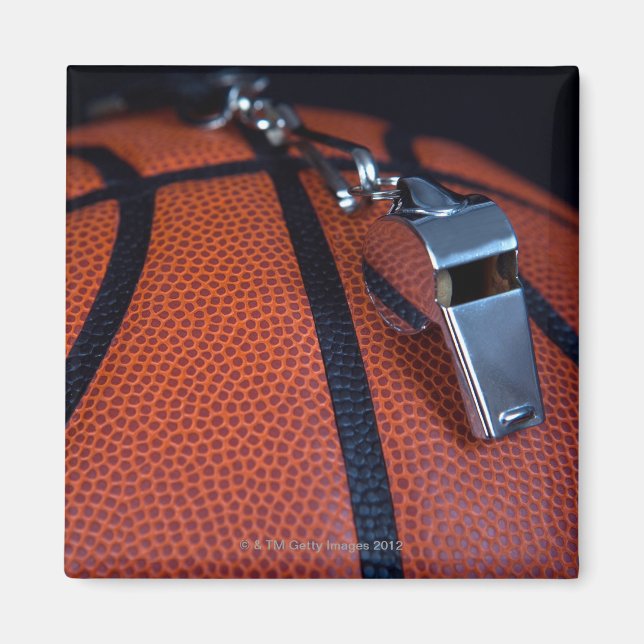 Imã O apito de um árbitro está sobre um (Frente)