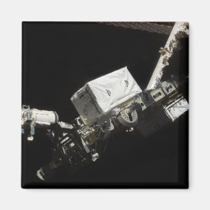 Imã O braço robótico do sistema de manipulador remot