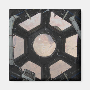 Imã O deserto do Sara visível através das janelas