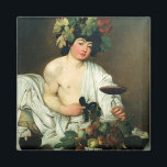 Imã O Jovem Baco, Caravaggio<br><div class="desc">O Jovem Baco - Pintura Barroca Italiana de Caravaggio. Michelangelo Merisi da Caravaggio (1571 - 1610) foi artista italiano ativo em Roma, Nápoles, Malta e Sicília entre 1593 e 1610. Suas pinturas, que combinam uma observação realista do estado humano, tanto física quanto emocional, com o uso dramático da iluminação, tiveram...</div>