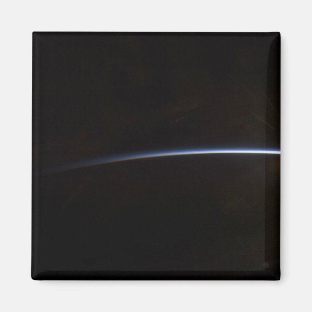 Imã O nascer do sol como visto no espaço (Frente)