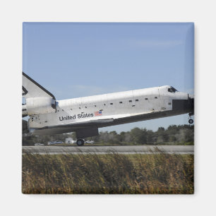 Imã O vaivém espacial Atlantis toca para baixo
