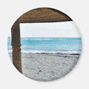 Imã Opinião da praia sob o parasol
