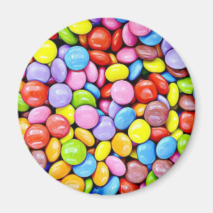 Imã Os doces coloridos remendam ímãs do refrigerador