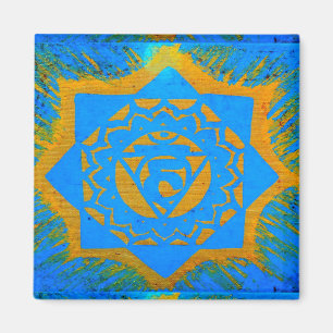 Imã ouro no símbolo tantric azul
