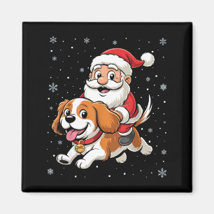 Imã Papai Noel montado em Cavalier King Charles Spanie