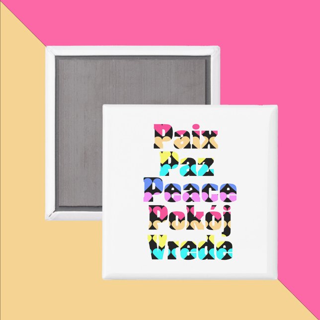 Imã Paz em muitas línguas corações brilhantes (A magnet that says peace in a variety of languages with a colorful heart pattern)