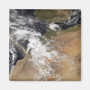 Imã Penas da poeira fora da costa marroquina