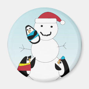 Imã Pinguins construindo um boneco de neve no inverno