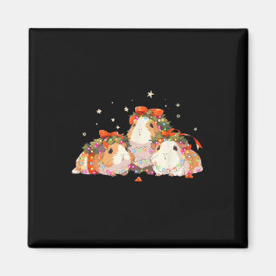 Imã Porcos-guineenses Amarrados Nas Luzes De Natal Gui