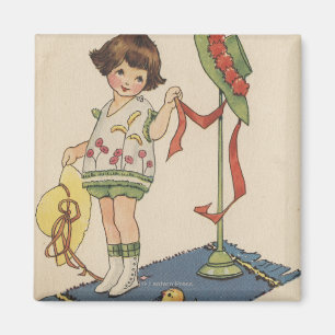 Imã Rapariga com chapéu amarelo e Pintinho