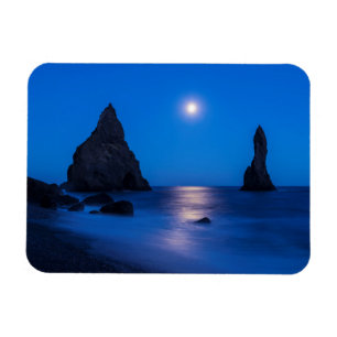Ímã Reflexo do luar no oceano e pilares de pedra