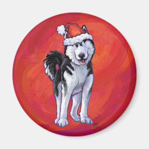 Imã Rouco no chapéu do papai noel no vermelho