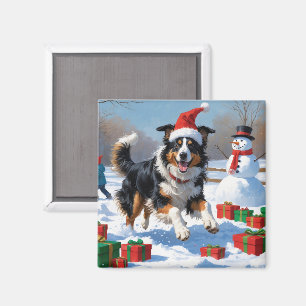 Imã Rough Collie Correndo na Neve com Chapéu de Natal