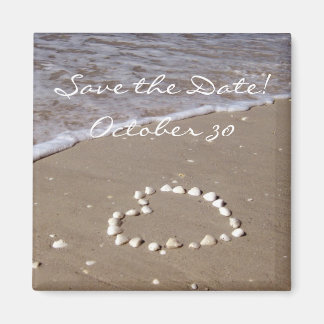 Imã Shell Heart na praia Sandy