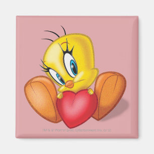 Imã Tweety segurando coração
