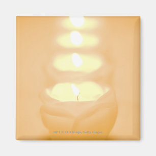 Imã Uma fileira de velas iluminadas