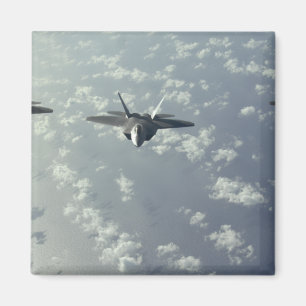 Imã Uma formação do três-navio dos raptores F-22