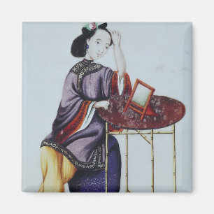 Imã Uma mulher chinesa que arranja seu cabelo