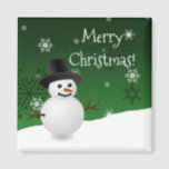 Imã Verdes Snowman Winter Scenery Christmas Magnet<br><div class="desc">Adicione um toque festivo à sua cozinha nesta temporada de festas com um imprevisível Snowman Green Winter Scenery Christmas Magnet. O design do ímã apresenta um boneco de neve feliz em uma cena de vento de neve contra um fundo verde adornado com flocos de neve de cor correspondente. Itens adicionais...</div>