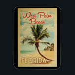 Ímã Viagens vintage de Palm Beach<br><div class="desc">Uma impressão de arte moderna de West Palm Beach,  na Flórida,  do século médio,  em estilo viagens vintage. Ele apresenta uma palmeira curva na praia arenosa com oceano sob um céu azul nublado.</div>