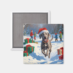 Imã Weimaraner Correndo na Neve com Chapéu de Natal