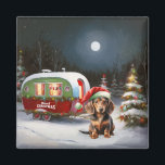 Imã Winter Dachshund Caravan Christmas Adventure<br><div class="desc">Adotar a magia de uma noite de inverno nevada enquanto uma caravana desliza graciosamente através da paisagem iluminada pela lua. A beleza serena da neve escutadora e o brilho encantador da lua criam uma cena cativante,  prometendo uma aventura inesquecível de Natal cheia de calor,  alegria e memórias queridas.</div>