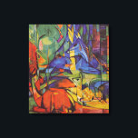 Impressão Em Tela Deer in the Forest II de Franz Marc, Vintage Art<br><div class="desc">Deer in the Forest II (1914) de Franz Marc é uma pintura de animais selvagens de arte e expressionismo vintage. Várias criaturas florestais, veados, um morcego e um filhote com manchas, deitados numa floresta cercada por árvores. Um fundo bonito, brilhante e colorido. Sobre o artista: Franz Marc (1880-1916) foi um...</div>