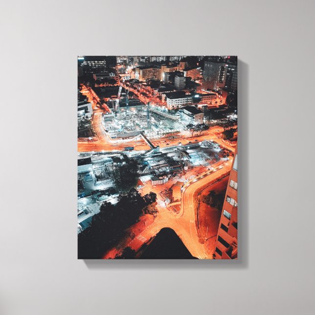 Impressão Em Tela Foto aérea dos edifícios da cidade durante a noite (Frente)