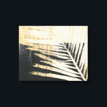 Impressão Em Tela Ouro Raffia - Fronteiras das Palmas<br><div class="desc">Ouro Raffia II por Jennifer Paxton Parker. Apresenta uma palma de solteiro de silhueta de folhas em cores preta e amarela/castanho.</div>