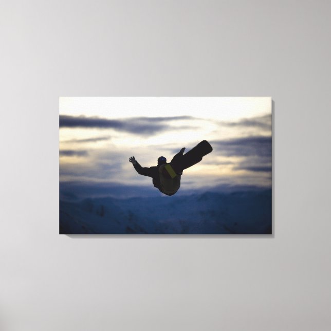 Impressão Em Tela Um moto de neve faz um sacudir enquanto cavalga (Frente)