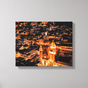 Impressão Em Tela vista de pássaros sobre a cidade iluminada