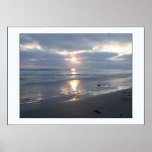 Impressão tormentoso do por do sol da praia