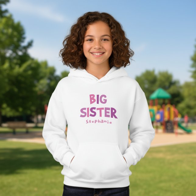 Irmã Mais Velha Personalizada (Personalized big sister hoodie with a custom name and girly colored typography.)