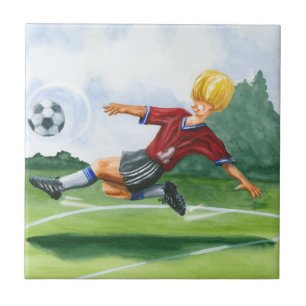 Jogador de futebol batendo uma bola por Jay Throck