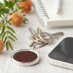 Joias de gelatina efeito Chaveiro vermelho<br><div class="desc">Um design com um padrão impresso de pequenas joias vermelhas de geleia contra um ouro escuro e fundo vermelho.</div>