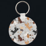 Labradoodle / Goldendoodle Bones e Chaveiro de pat<br><div class="desc">Cães de Labradoodle/Goldendoodle bonitos sentam-se e ficam de pé e rollover com creme,  damasco,  chocolate,  casacos pretos e participas com ossos de cão espalhados e padrões de pegadas.</div>